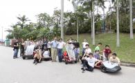 Prof David Lam and Prof Chung-nin Ko (in the middle left and right respectively), the four groups of students (from right to left: Group 2, Group 4, Group 1 and Group 3) and teaching and technical staff of the electric vehicle course