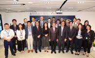 Representatives of participating companies and professional institutions in the aviation industry pose for a photo after souvenir presentation by Swire Professor of Aerospace Engineering Prof Xin Zhang (3rd from left, front row), Chair Professor of Mechanical and Aerospace Engineering, also with Ms Candy Nip (6th from right, front row), Principal Assistant Secretary for Transport and Housing (Transport), Prof Tim Kwang Ting Cheng (5th from right, front row), Dean of Engineering, and Prof Christopher Chao (1