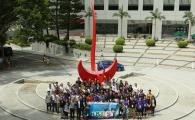 The camp participants, together with the School's faculty, staff and student helpers, pose for a picture by the sundial at the HKUST Entrance Piazza.	 