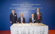 HKUST President Prof. Wei SHYY (second left) and Vice President of Country Garden & President of Guangdong Bright Dream Robotics Mr. SHEN Gang (second right), sign the donation agreement.	 