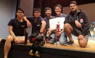 The winning team: (from left) Mak Ka-Hei, Leung Pok-Man, Mak Kin-Wing, Lee Chun-Hei and Amrutavarsh Sanganabasappa Kinagi, with their autonomous biped robot in front.