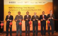 Ribbon cutting by the officiating party. (From left) Dr Cheung Nim-kwan, General Co-Chair of the Organizing Committee; Prof. Roberto de Marca, Executive Chairman of the Organizing Committee; Mr John Tsang, Financial Secretary, Hong Kong SAR Government; Dr Gordon Day, President-Elect, IEEE; Prof. K. B. Letaief, General Co-Chair of the Organizing Committee and HKUST Dean of Engineering; and Prof. Yrjö Neuvo, Program Committee Chair.