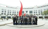 Delegation of HKJC takes a group photo at the iconic “Red Bird Sundial”.