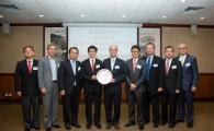 Presentation of souvenir by CMA to HKUST (from left to right: Dr Tony Tai, Mr Marvin Hsu, Mr Johnny Yeung, Dr Eddy S H Li, Prof Tony F Chan, Dr Tsui Ping Kwong, Dr Eden Woon, Mr Ng Ching Wun and Dr Lo Yuk Lam.