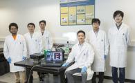 The team has successfully made the prototype of the “super human eye” – an artificial visual system that uses a spherical biomimetic electrochemical eye with hemispherical retina made of a high-density perovskite nanowire array. From left: Swapnadeep Poddar, Shu Lei, Zhang Daquan, Prof. Fan Zhiyong, Dr. Gu Leilei and Long Zhenghao.