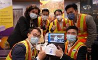 The winning team of the Sino-HKUST One Million Dollar Entrepreneurship Competition founded AutoSafe, an AI solution company leveraging smart technology to modernize and automate worksite safety monitoring while improving efficiency. In the photo: Issac LEUNG, co-founder (first left, back row), Prof. Jack CHENG (second right, back row), and Peter WONG, co-founder (first right, front row).