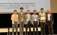 Prof. Shen Shaojie (third right), his current PhD students Jiang Chenxing (first author, second right), Liu Peize (first left) and Yu Zehuan (second left), and former PhD student Dr. Zhou Boyu (third left) received an IEEE Robotics and Automation Letters Best Paper Award at the IEEE International Conference on Robotics and Automation 2024.
