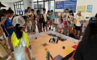 Children had fun controlling the robot designed for The Robot Explorer Cup, one of the major competitions hosted by GCE.