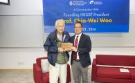 Dean of Engineering Prof. Hong K. Lo (right) presented a tailor-made wooden plaque to Prof. Chia-Wei Woo (left) in appreciation of his insightful sharing. The plaque was made from preserved wood of the Acacia Confusa trees on campus that were cut down to make way for the construction of the new Innovation Building. 