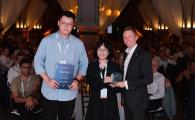 Civil Engineering PhD students Gong Xingbo (left) and Xu Yuqing (center) in Prof. Jack Cheng’s team received the grand award in the Student Research Category of buildingSMART International openBIM Awards 2024 at the banquet of buildingSMART International Summit cum CIB W78 Conference.