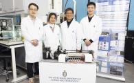 Prof. Sun Qingping (second right) and Prof. Yao Shuhuai (second left), both Professors of the Department of Mechanical and Aerospace Engineering (MAE), MAE Postdoctoral Research Associate Dr. Zhou Guoan (first left), and MAE PhD student Li Zexi (first right) with the world’s first kilowatt-scale elastocaloric green cooling device they develop.