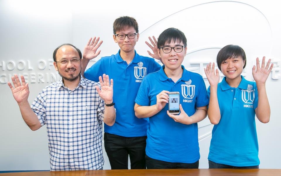 (from left) HKUST’s Prof Brian Mak and students – Kelvin Yung, Ken Lai and Mary Leung – demonstrating how to say “clap hands” in sign language.