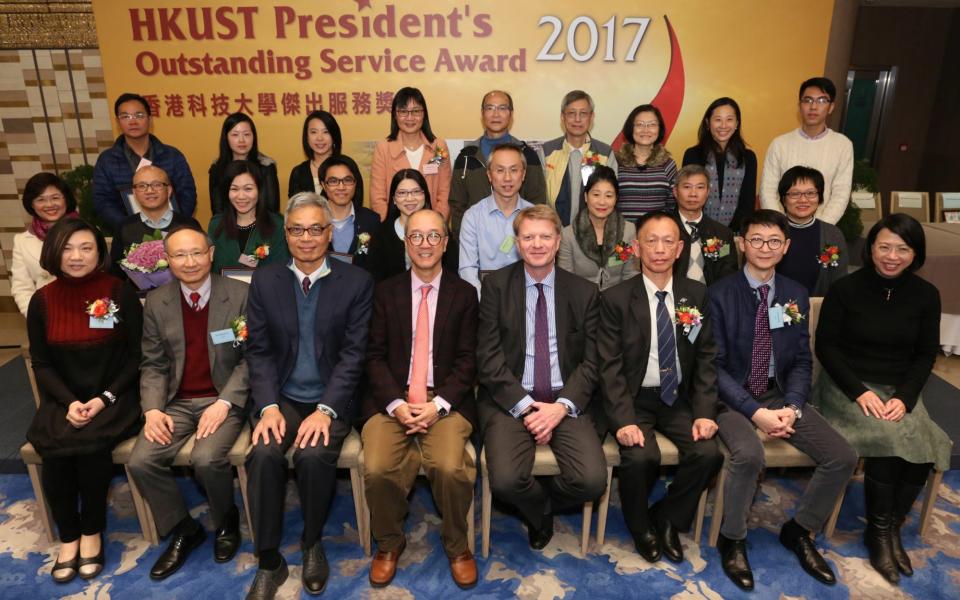 A group photo of the award winners with President Prof Tony F Chan (fourth from left, front row), Executive Vice-President and Provost Prof Wei Shyy (third from left, front row), Vice-President for Administration and Business and Chairman of the Selection Committee for the awards Mr Mark Hodgson (fourth from right, front row), and other senior staff members at the award presentation ceremony.