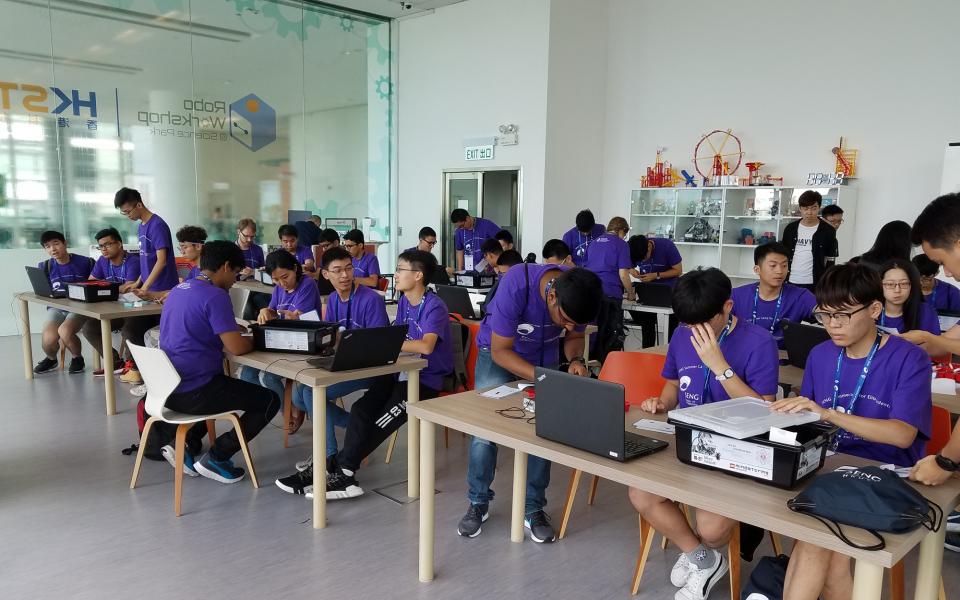 Participants join a robotics workshop at Science Park. 