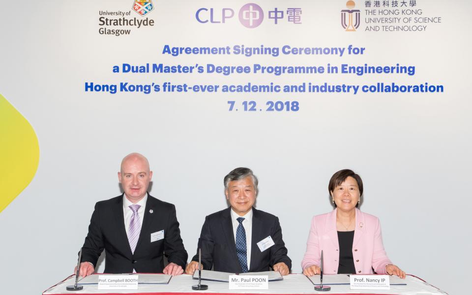 CLP Power Academy Vice Chancellor Mr. Paul Poon (middle), HKUST’s Vice-President for Research and Development Prof. Nancy Ip (right), and Head of the Department of Electronic and Electrical Engineering at the University of Strathclyde Prof. Campbell Booth (left) sign the agreement.  