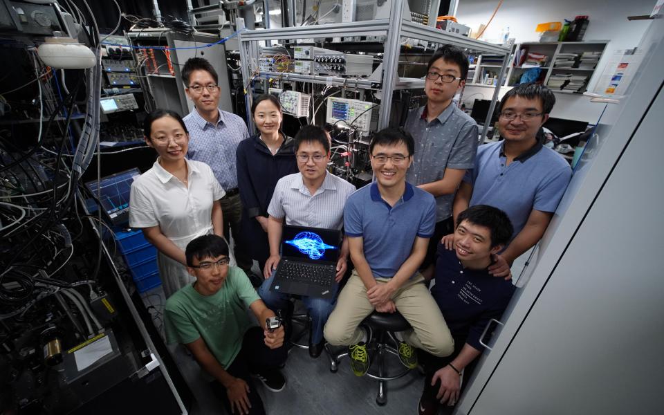 Prof. DU Shengwang (middle left, seated), Prof. LIU Junwei (middle right, seated), Prof. JO Gyu-Boong (back left, standing) and their research team