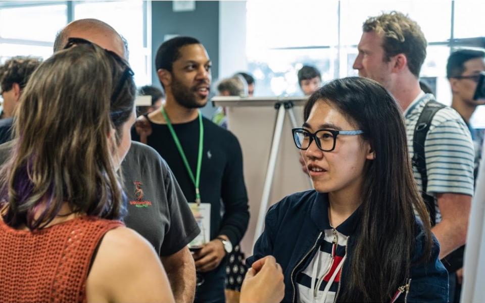 Interacting with Google researchers at the poster session of Google PhD Fellowship Summit 2019.