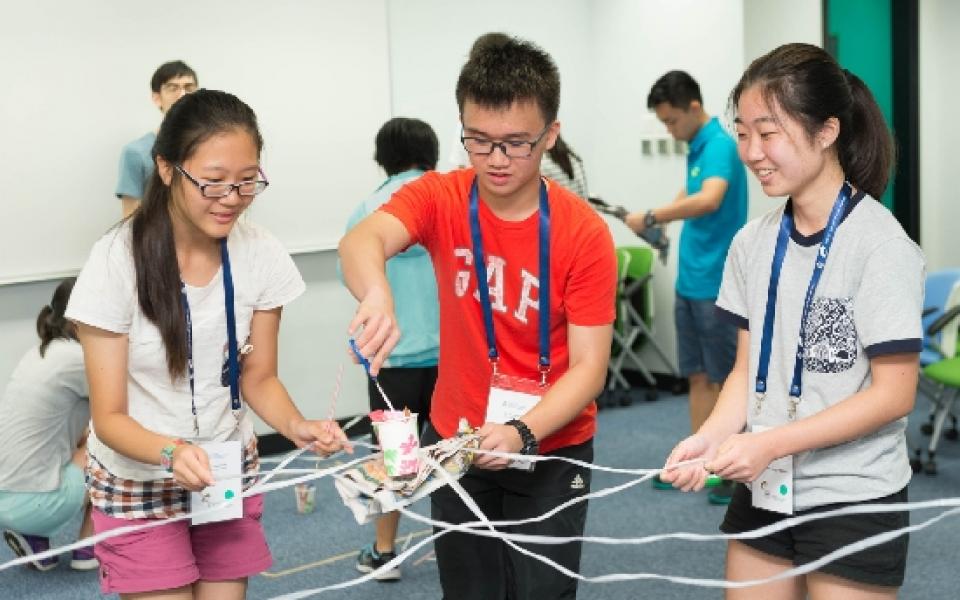 Students engaged in ice-breaking activities on the first day of the camp. 