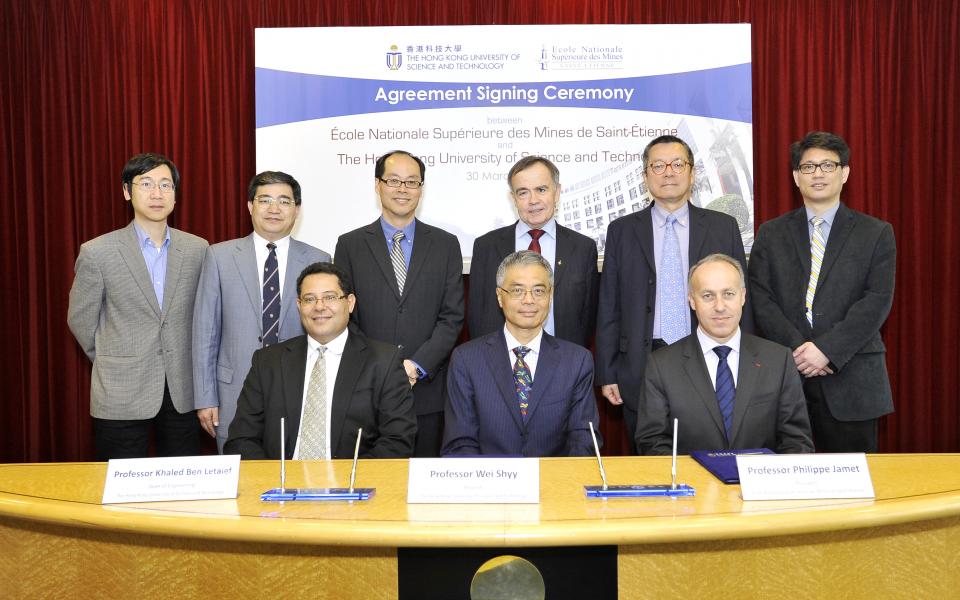 At the signing ceremony: (front row from left) HKUST Dean of Engineering Prof Khaled Ben Letaief, HKUST Provost Prof Wei Shyy, ENSMSE President Prof Philippe Jamet, ENSMSE Vice President Prof Michel Cournil (back row, 3rd from right), HKUST Vice-President for Institutional Advancement Dr Eden Woon (back row, 2nd from right), and professors from HKUST. 