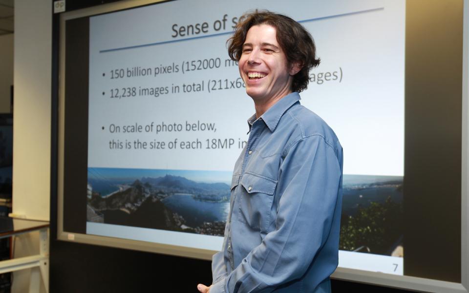 Prof Sander explaining the size of his photo