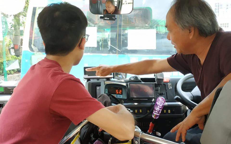 Communicating with a minibus driver to familiarize themselves with minibus operations and develop practical solutions for the app.