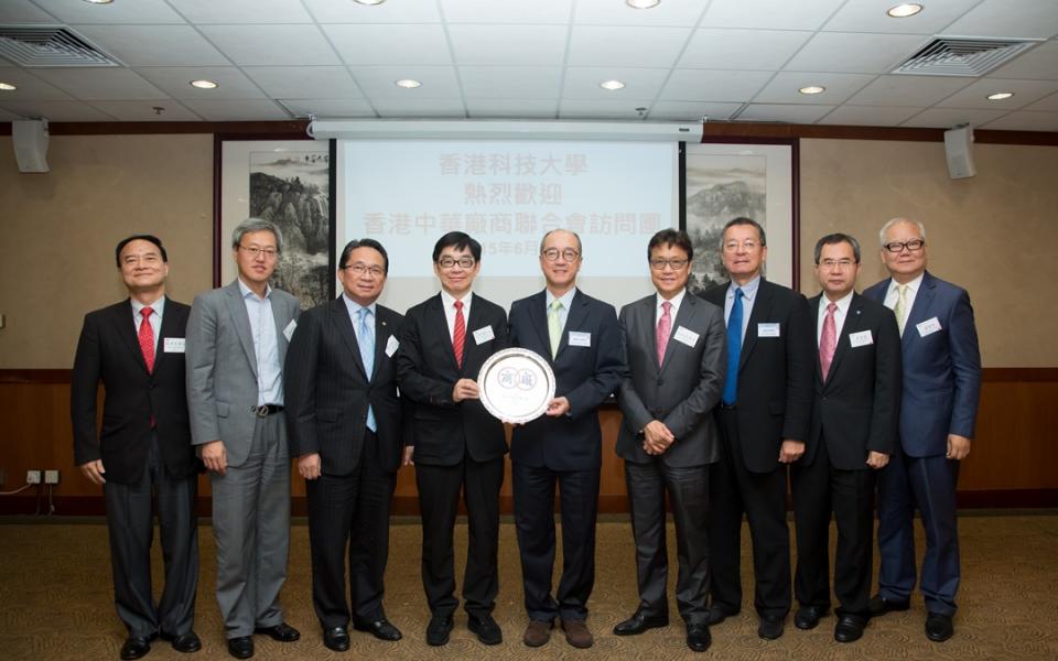 Presentation of souvenir by CMA to HKUST (from left to right: Dr Tony Tai, Mr Marvin Hsu, Mr Johnny Yeung, Dr Eddy S H Li, Prof Tony F Chan, Dr Tsui Ping Kwong, Dr Eden Woon, Mr Ng Ching Wun and Dr Lo Yuk Lam.