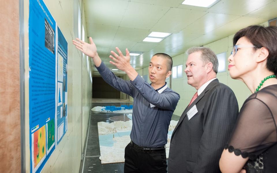 Dr Isaac Shum, Engineer of CLP Power Wind/Wave Tunnel Facility, explained to Mr Richard Lancaster, Chief Executive Officer of CLP Holdings, and Ms Quince Chong, Chief Corporate Development Officer, CLP Power (Hong Kong) Ltd, the operation of the wind tunnel.