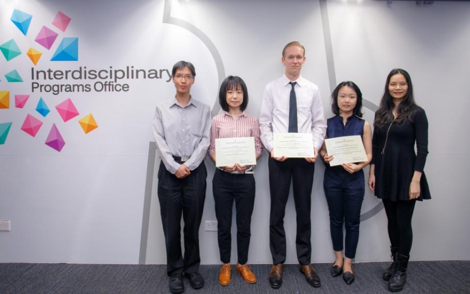 Prof. Raymond Wong (left), RMBI Program Director, and Dr. Kris Pan (right), Project Supervisor presented award certificates to Team E awardees