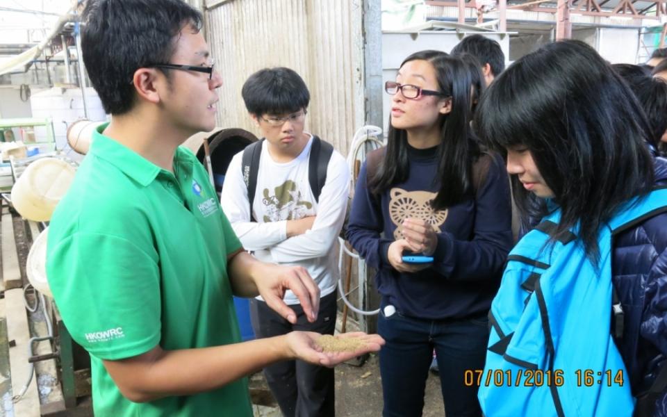 Staff of Hong Kong Organic Waste Recycling Centre explains the food waste recycle processing