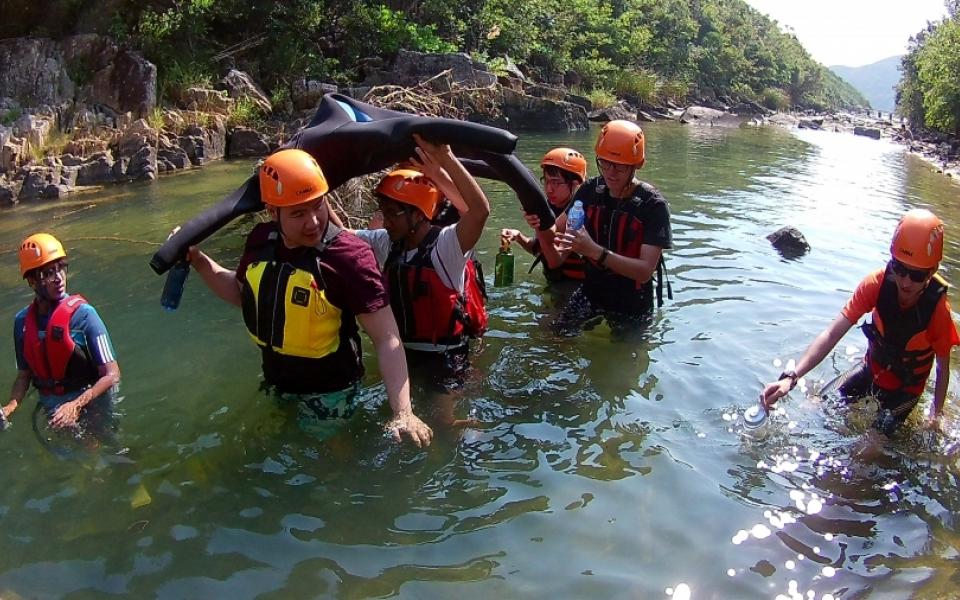 Students were required to save the dummy teammate from water