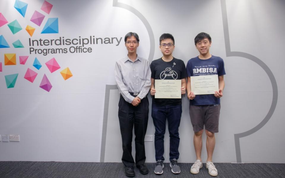 Prof. Raymond Wong (left), RMBI Program Director, presented award certificates to Team C awardees