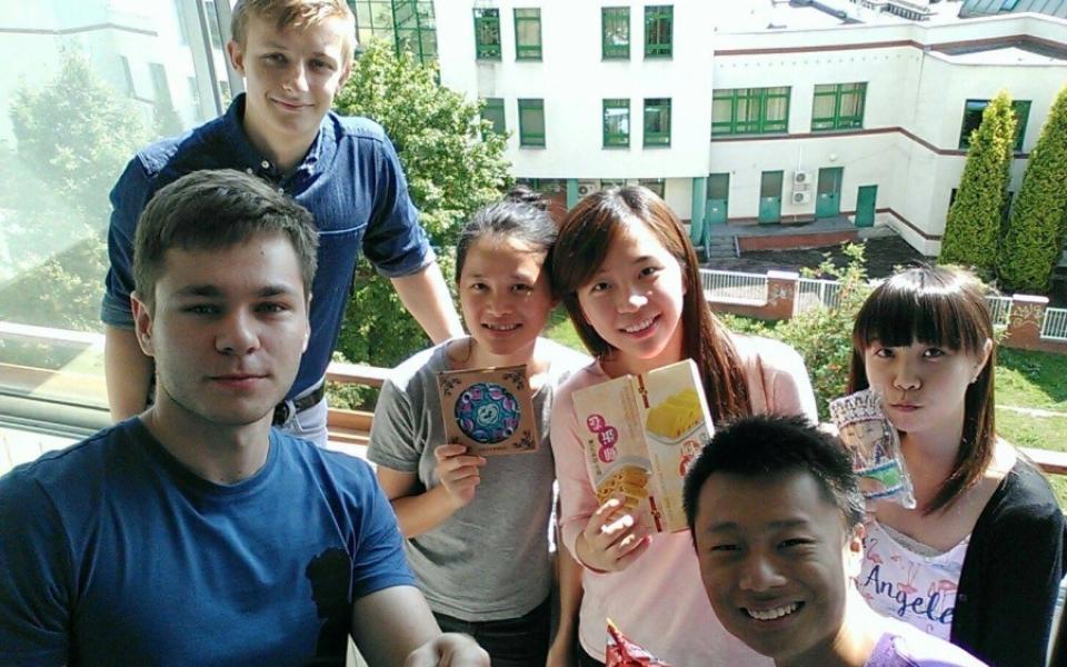 Rax (second right) and Hong Kong delegates visited the apartment of the host students in Poland