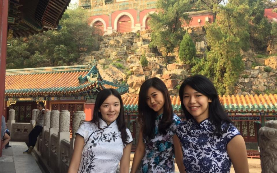 Isa (left) visited Forbidden City with teammates