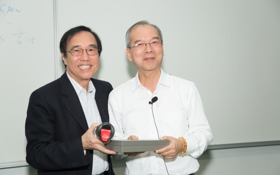 Prof. Chi Ming CHAN (left), Founder of T&M-DDP, presented souvenir to Dr. Augustine CHOW