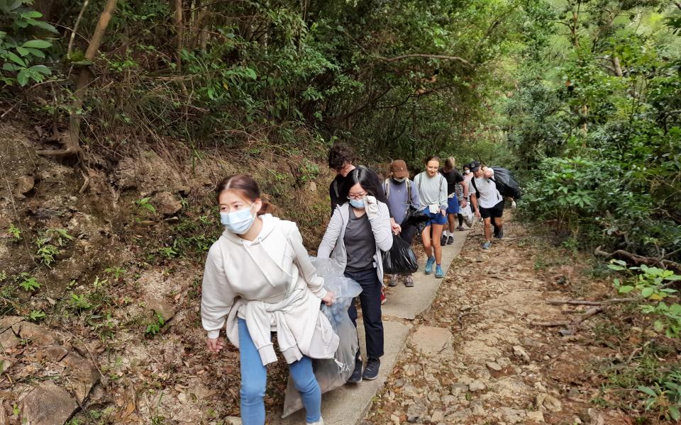 Hiking trip to clean up the trail in Little Hawaii Falls before Christmas.