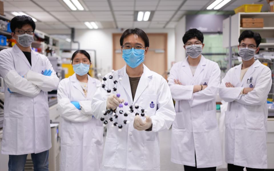 Prof. Sun (middle) and his research team