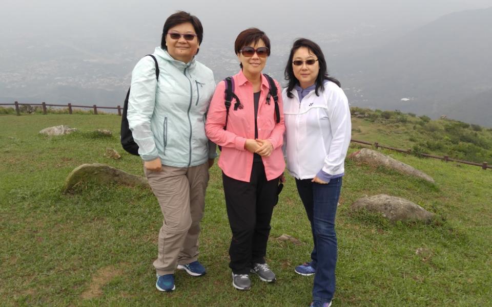 Prof. Ip (middle) like hiking in her leisure time.