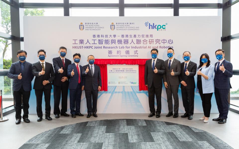 HKUST Vice-President for Research and Development Prof. Tim Cheng (fifth left), HKUST (GZ) Vice-President for Graduate Support and HKUST CLP Holdings Professor of Sustainability Prof. Charles Ng Wang-Wai (fourth left), HKPC Executive Director Mr. Mohamed Butt (fifth right), HKPC Chief Digital Officer Mr. Edmond LAI (fourth right), HKUST Otto Poon Professor of Engineering, Chair Professor from the Department of Computer Science and Engineering and Joint Lab Director Prof. Zhou Xiaofang (third left), HKPC Gen