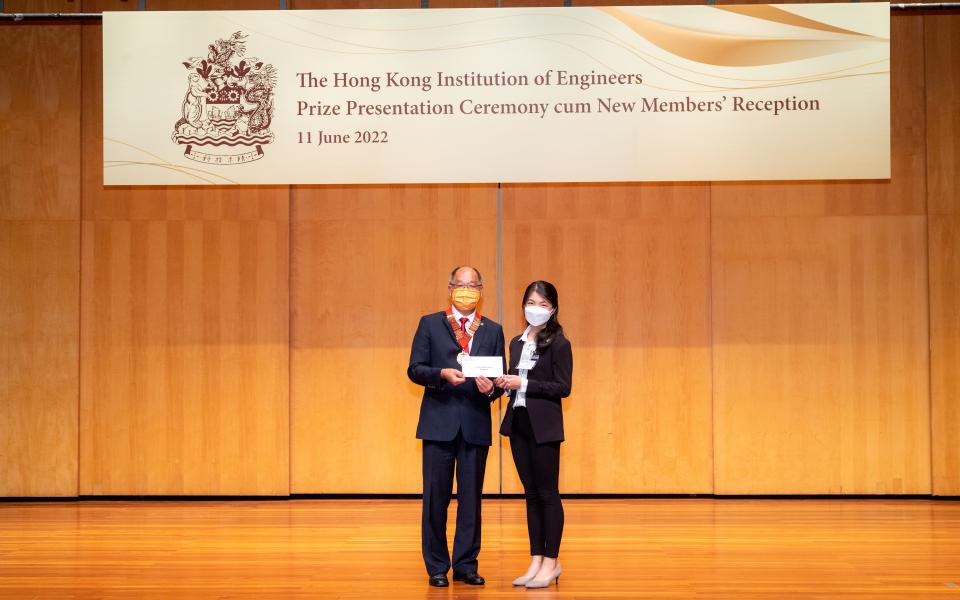 2019/2020 awardee Cindy Aiko Filbert Tanaka (right) was presented the scholarship by HKIE President Ir. Edwin Chung (left).
