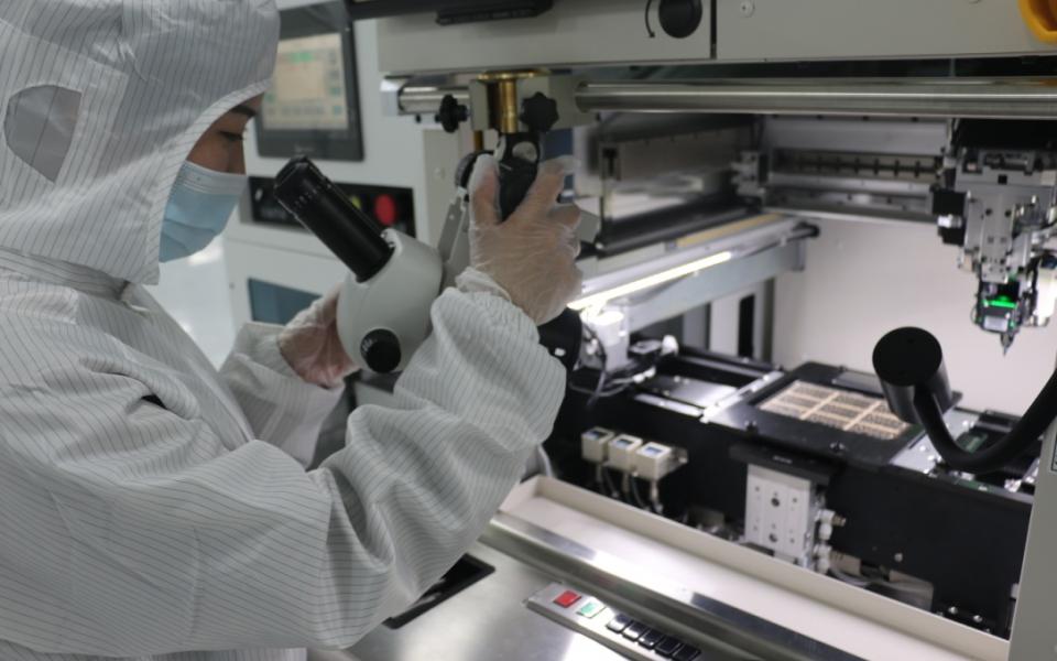 : A chip-to-package bonding machine operating in the module factory in JSAB, Ningbo.