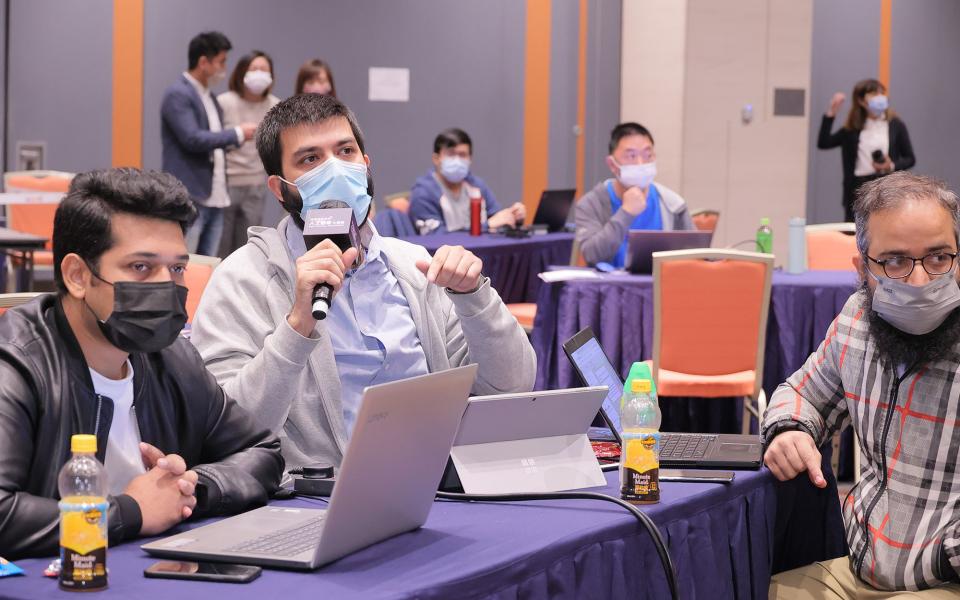 (From left) PhD students Syed Awais Wahab Shah (Electronic and Computer Engineering), Muhammad Waqar, and Muhammad Zeshan Akber (both from Civil and Environmental Engineering) at the competition workshop in December 2021.