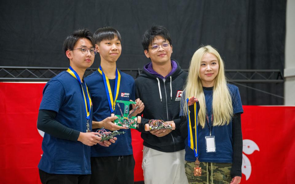 A team of four students built three robots and made a clean sweep of the gold, silver and bronze medals in the NatCar event.