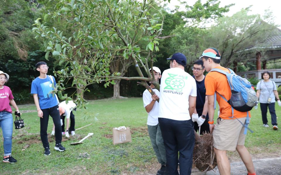 As a symbolic gesture, each participant signed their name on the saplings. 