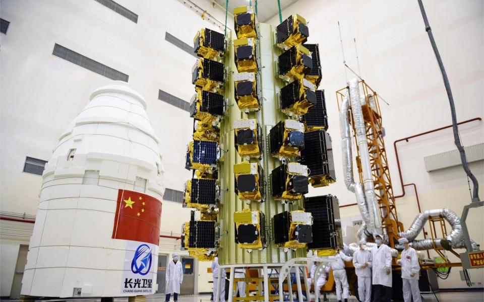 Chang Guang Satellite Technology Company researchers assembling satellites for launch. The company has 108 satellites in orbit, creating the world’s largest sub-meter commercial remote sensing satellite constellation. A long-term strategic collaboration is now in place with HKUST. (Photo credit: Chang Guang)