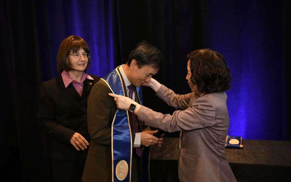 Prof. Gary Chan (center) was inducted as a Sigma Xi Fellow in the second annual International Forum on Research Excellence, which was held in California in November 2023.