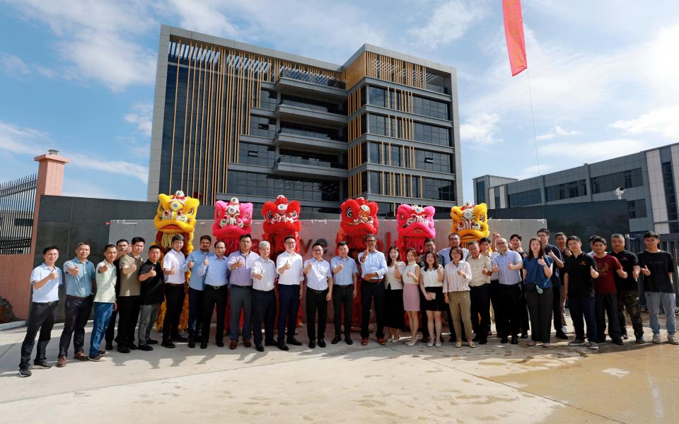 Dr. Louis Lam (front row, twelfth left) and other senior management of Active Tools in front of the company’s new plant in Taishan, Guangdong Province. The plant was officially opened in July 2023.