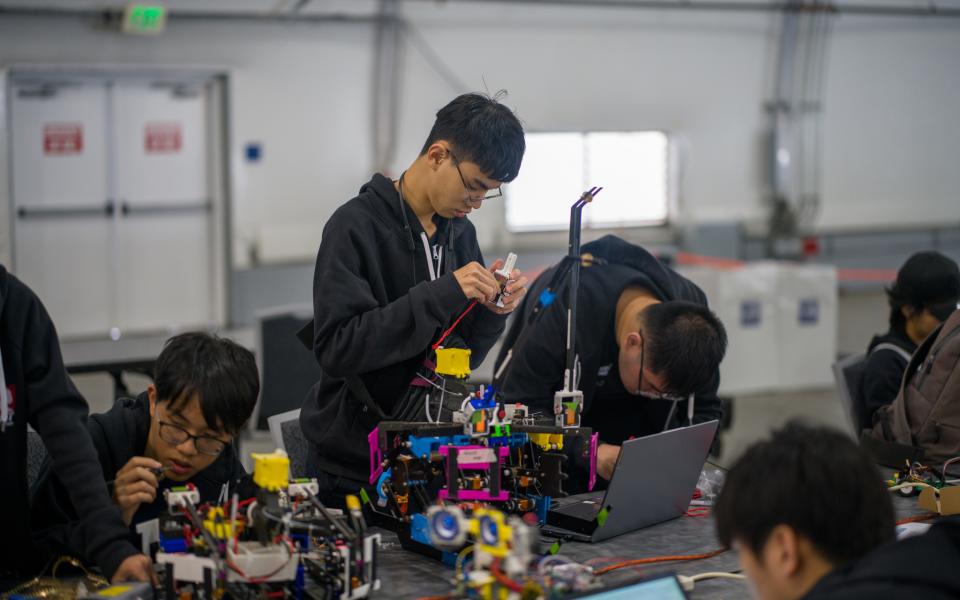 The HKUST team was preparing their robots.