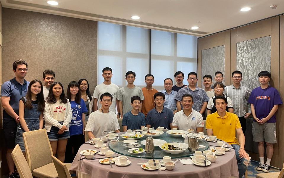 Prof. Patrick Yue (front row, second right) and his research team