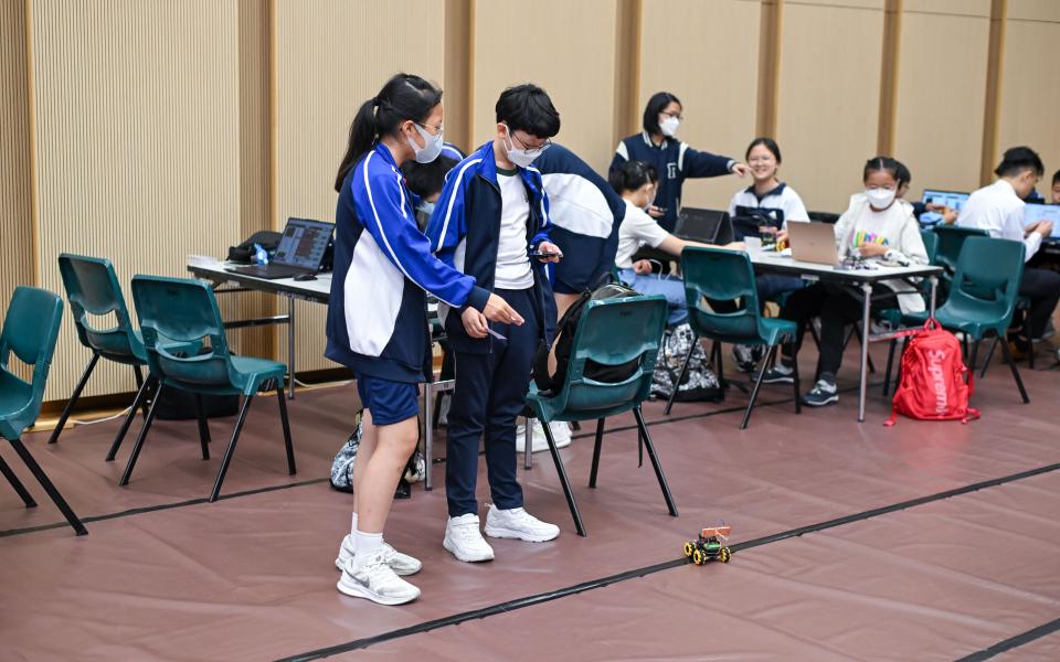 Participants were testing the fencing robot.