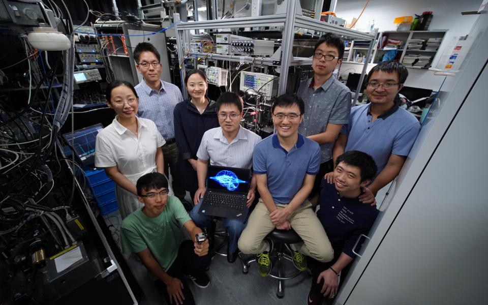 Prof. DU Shengwang (middle left, seated), Prof. LIU Junwei (middle right, seated), Prof. JO Gyu-Boong (back left, standing) and their research team 